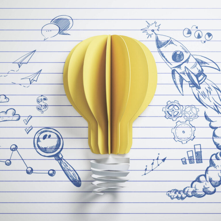 Bild zum Workshop "Mit Luft MINT machen", zeigt eine Glühbirne aus Papier, mit Zeichnungen von Raketen, Fliegern und Wolken